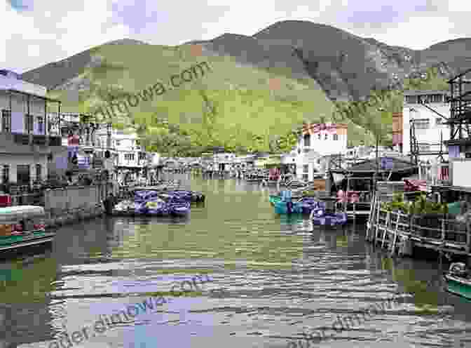 A Peaceful And Tranquil Scene Of The Tai O Fishing Village In Hong Kong, Featuring Stilt Houses And A Serene Waterfront Hong Kong Travel Guide (Unanchor) Between The Skyscrapers Hong Kong 3 Day Discovery Tour