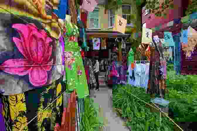 A Vendor Selling Street Food At A Market In Kensington Market, With A Variety Of Colorful Dishes On Display. Kensington Market: The Story Of A Toronto Neighbourhood