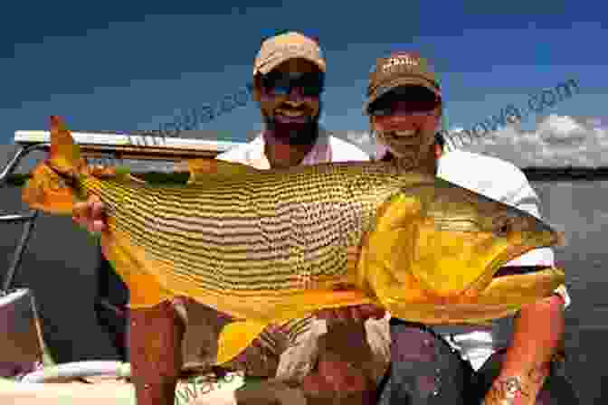 An Angler Holding A Large Golden Dorado In A Tropical River Wild South: Hunting And Fly Fishing The Southern Hemisphere