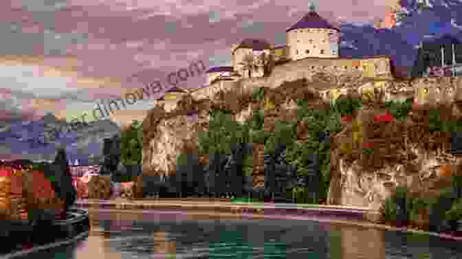 Charming View Of Kufstein's Old Town, Featuring Colorful Buildings, Cobblestone Streets, And The Rushing Inn River In The Foreground Kufstein: Gateway To Tyrol